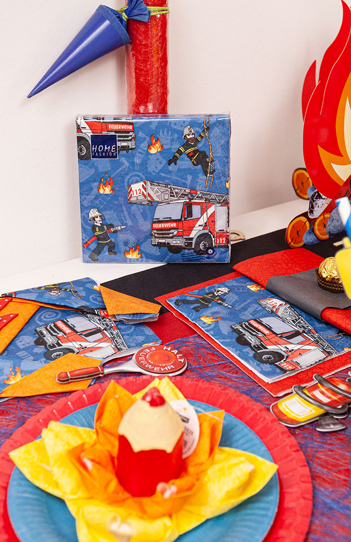 Table decoration for boys for their birthday with firefighter, fire engine printed on napkin
